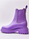 One violet leather chelsea boot.